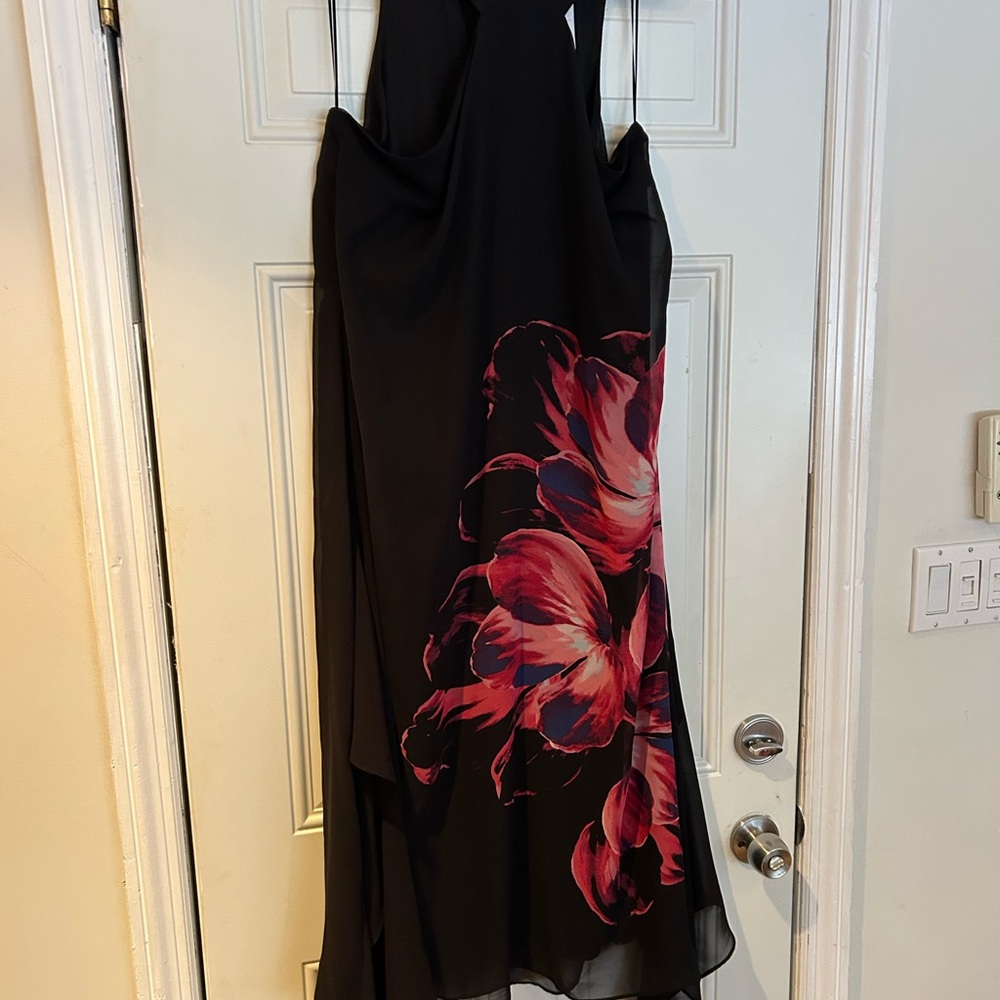 Jennifer Lopez Black Dress with Red Floral Design